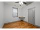 Bedroom with a ceiling fan, built in desk and wood floor at 282 Granite Mill Blvd, Chapel Hill, NC 27516