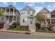 Charming two-story home with landscaped yard and inviting front porch, complemented by neighboring residences at 282 Granite Mill Blvd, Chapel Hill, NC 27516
