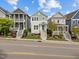 Attractive street view showcasing multiple homes, each with unique architectural details and inviting front porches at 282 Granite Mill Blvd, Chapel Hill, NC 27516
