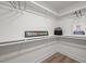 Walk in closet features plenty of shelf and rack storage at 3014 Hope Valley Rd, Durham, NC 27707