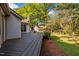 Spacious wood deck complements the home's exterior, perfect for outdoor gatherings and enjoying the serene backyard at 3014 Hope Valley Rd, Durham, NC 27707
