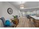 Open floor plan features a dining nook, living room, and access to the front entrance at 3014 Hope Valley Rd, Durham, NC 27707