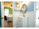 View of a bathroom with a white vanity with storage at 3336 Tarleton W, Durham, NC 27713
