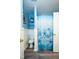 Cozy bathroom with wood-look flooring and a starfish-themed shower curtain at 3336 Tarleton W, Durham, NC 27713