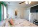 Bright bedroom with a ceiling fan, multiple closets, and an ensuite at 3336 Tarleton W, Durham, NC 27713
