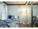Bedroom with hardwood floors, a window, and mirrored closet doors at 3336 Tarleton W, Durham, NC 27713