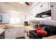 The kitchen features lots of white cabinets, modern appliances, and tile backsplash at 3336 Tarleton W, Durham, NC 27713