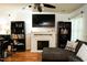 Comfortable living room with white fireplace and ceiling fan at 3336 Tarleton W, Durham, NC 27713