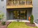 Cozy backyard patio with outdoor seating and a sliding glass door to the home's interior at 4504 Mint Leaf Ln, Raleigh, NC 27612