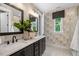 Spa-like bathroom features double sinks, modern fixtures, and a walk-in shower at 4504 Mint Leaf Ln, Raleigh, NC 27612