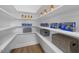 Bright pantry features ample shelving and storage for food and household items at 4504 Mint Leaf Ln, Raleigh, NC 27612