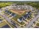 Aerial view of community homes with landscaping, sidewalks and streets at 4524 Flat Bastion Drive Dr, Raleigh, NC 27610