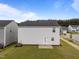 Spacious backyard featuring a well-maintained lawn and a cozy patio, perfect for outdoor enjoyment at 4524 Flat Bastion Drive Dr, Raleigh, NC 27610