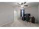 Bedroom showcasing a workstation, comfortable chair, and an organized closet at 4524 Flat Bastion Drive Dr, Raleigh, NC 27610