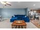 Spacious living room shows an open layout to the kitchen, offering a modern and relaxed living experience at 4524 Flat Bastion Drive Dr, Raleigh, NC 27610