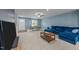 Open living space combines comfort and function, with a plush sofa and an adjacent dining area at 4524 Flat Bastion Drive Dr, Raleigh, NC 27610