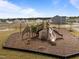 Playground with slides, climbing structures and swings offer a safe and engaging area for  at 4524 Flat Bastion Drive Dr, Raleigh, NC 27610
