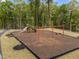 A playground with climbing structures, slides and swings provide fun recreational area at 4524 Flat Bastion Drive Dr, Raleigh, NC 27610