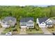 Beautiful home featuring manicured lawns, a welcoming porch, and a well-maintained exterior, nestled in a friendly neighborhood at 4803 Stony Falls Way, Knightdale, NC 27545