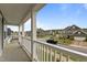 Scenic neighborhood view from a charming balcony, showcasing surrounding homes and a quiet street at 4803 Stony Falls Way, Knightdale, NC 27545
