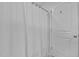 Clean bathroom showcasing a white shower curtain and a white door at 4803 Stony Falls Way, Knightdale, NC 27545