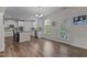 Bright eat-in kitchen featuring stainless appliances and an island with counter seating at 4803 Stony Falls Way, Knightdale, NC 27545
