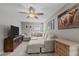 Spacious living room with a large sectional couch and unique decor at 4803 Stony Falls Way, Knightdale, NC 27545