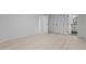 Spacious bedroom with light wood floors, ensuite bath, and ample closet space at 4812 Latimer Rd, Raleigh, NC 27609