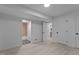Bedroom with light wood floors and doorways at 4812 Latimer Rd, Raleigh, NC 27609