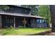 Charming home with a well-manicured front lawn and inviting entry at 4812 Latimer Rd, Raleigh, NC 27609