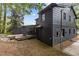 Exterior of home features backyard, deck and screened porch at 4812 Latimer Rd, Raleigh, NC 27609