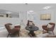Inviting living room with comfortable seating and view into the kitchen at 4812 Latimer Rd, Raleigh, NC 27609