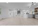 Large open living space with wood floors, neutral paint, and bright natural light at 4812 Latimer Rd, Raleigh, NC 27609