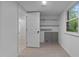 Storage room with utility closet, window and tiled floor at 4812 Latimer Rd, Raleigh, NC 27609