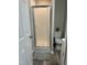 Bathroom featuring shower with sliding glass doors and a white vanity at 500 John St St, Clayton, NC 27520