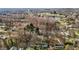 An aerial view shows the property's location surrounded by lush trees in a serene community at 505 E Graham St, Mebane, NC 27302