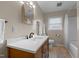 Bathroom featuring updated vanity, modern fixtures, and a clean, bright design at 505 E Graham St, Mebane, NC 27302