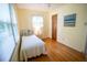 Cozy bedroom showcasing ample natural light and hardwood floors at 505 E Graham St, Mebane, NC 27302