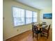 Bright dining area featuring hardwood floors and a window with natural light at 505 E Graham St, Mebane, NC 27302