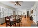 Open-concept living area with hardwood floors, natural light, and inviting atmosphere at 505 E Graham St, Mebane, NC 27302