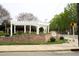 The Veterans Garden features brick architecture and a white pergola for reflection at 505 E Graham St, Mebane, NC 27302