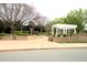 Veterans Garden view shows brick design, manicured shrubbery and peaceful walkways at 505 E Graham St, Mebane, NC 27302