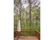 Exterior back deck view with mature trees and nature at 5507 Vista View Ct, Raleigh, NC 27612