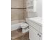 Bathroom with shower and tub, tile accent, and white vanity with drawers and cabinets at 5507 Vista View Ct, Raleigh, NC 27612