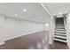 Large finished basement with paneled walls, recessed lights, and easy stair access at 5541 Old Still Rd, Wake Forest, NC 27587