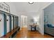 View of foyer with bench and coat racks and view of hardwood floors at 5541 Old Still Rd, Wake Forest, NC 27587