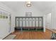 Front entryway of house with coat rack and bench in the foyer at 5541 Old Still Rd, Wake Forest, NC 27587