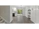 Bright kitchen and dining area with white cabinets, stainless steel appliances, and access to the deck at 5541 Old Still Rd, Wake Forest, NC 27587