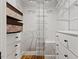Walk-in closet featuring drawer-based storage solutions and custom shelving at 5541 Old Still Rd, Wake Forest, NC 27587