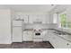 Clean kitchen with white cabinets and appliances at 56 Marlless Dr # A & B, Franklinton, NC 27525